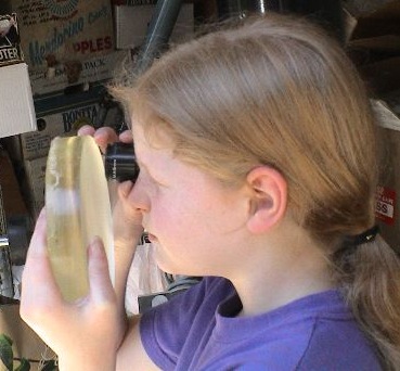 Checking for pits to see if polishing is complete.